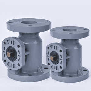 Two CPVC flanged ball valve bodies with mounting pads ready for automated pneumatic or electric actuators