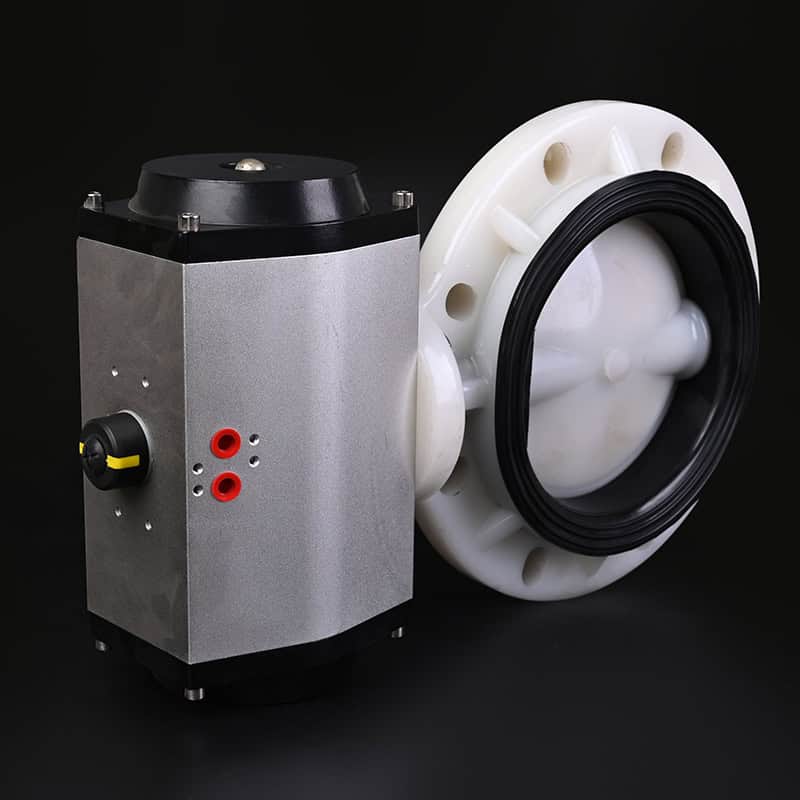Heavy-duty PVDF air actuated butterfly valve equipped with a pneumatic actuator, providing fail-safe automated control for severe chemical processing.