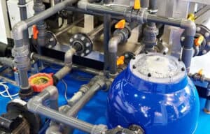 Industrial plastic valves and fittings installed in a water treatment and filtration system