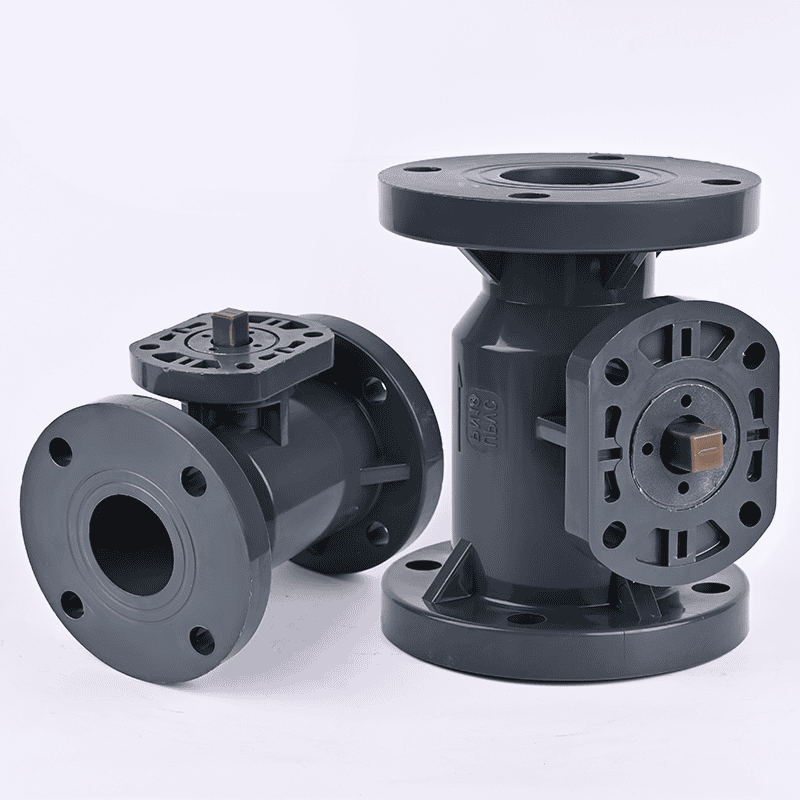 Two dark gray UPVC flanged ball valve bodies without handles, featuring ISO 5211 mounting pads for pneumatic or electric actuators