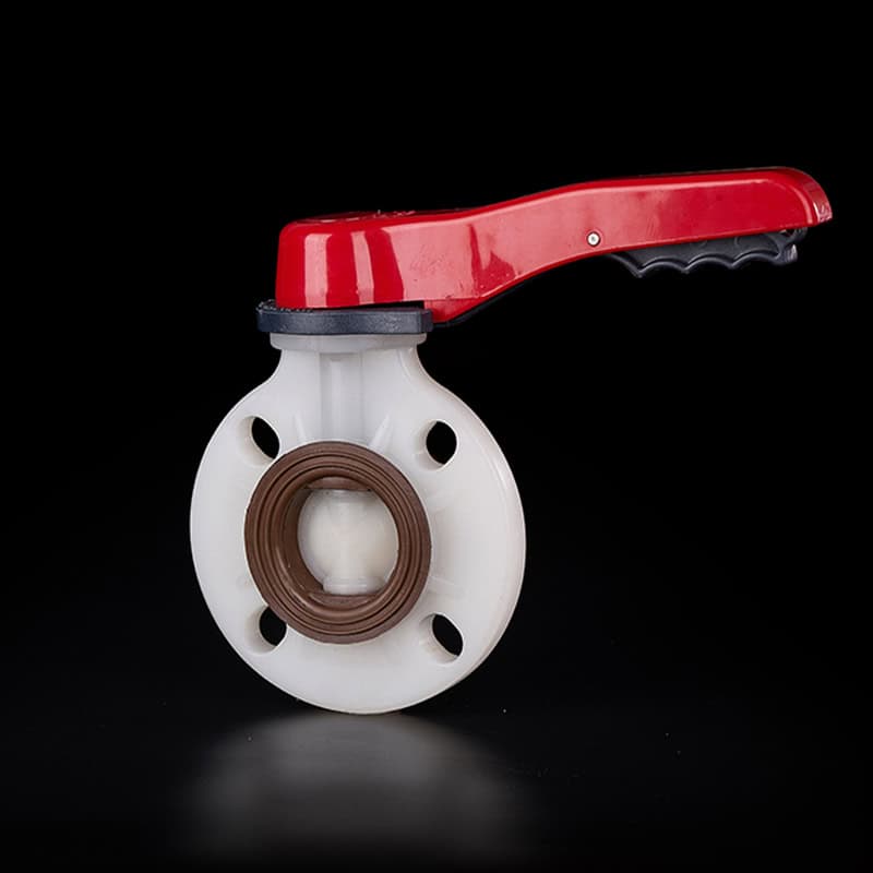 Lever-operated wafer-type PVDF plastic butterfly valve with high-temperature Viton seals and a red handle for semiconductor cleanrooms and acid piping